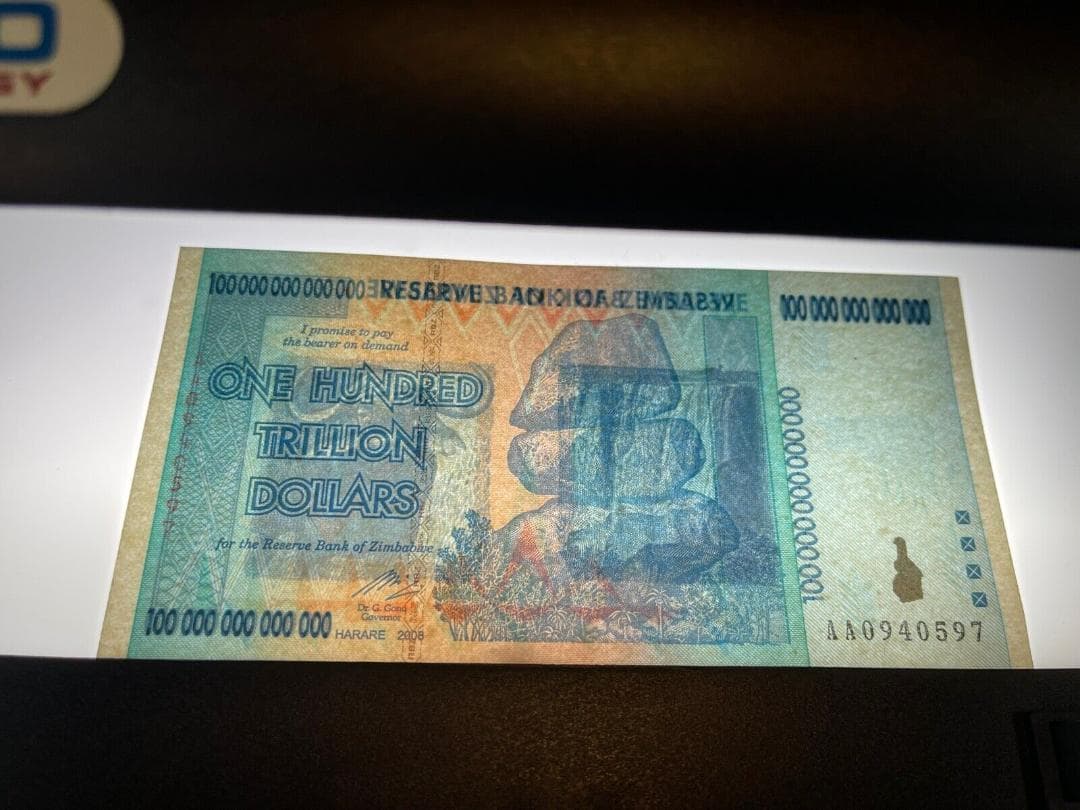 【鑑定書付き・ジンバブエ100】貴重なジンバブエ100ドル紙幣　新品未使用　1枚