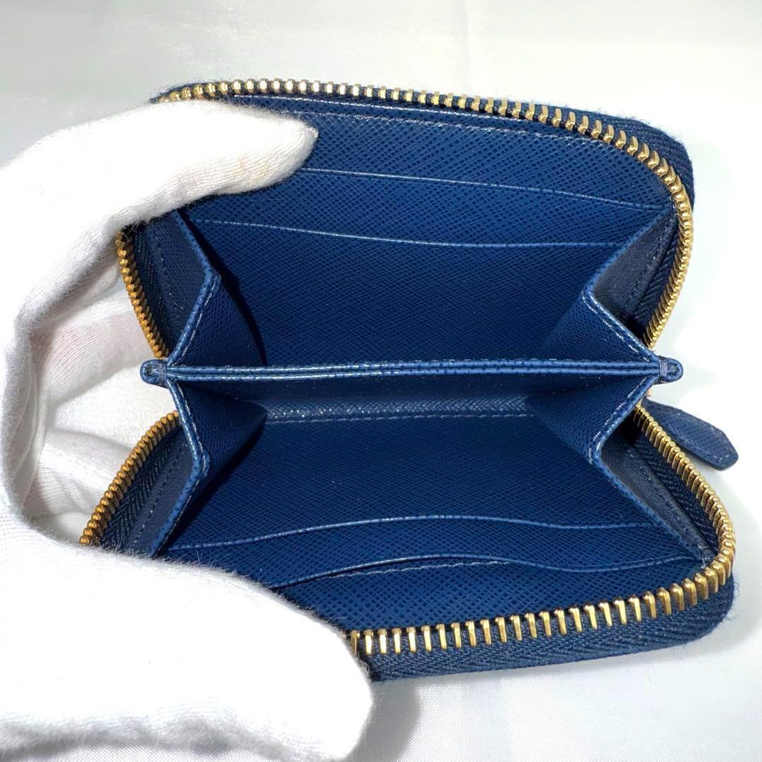 ぶーにゃん ✨極美品✨PRADA プラダ サフィアーノレザー ラウンドジッ