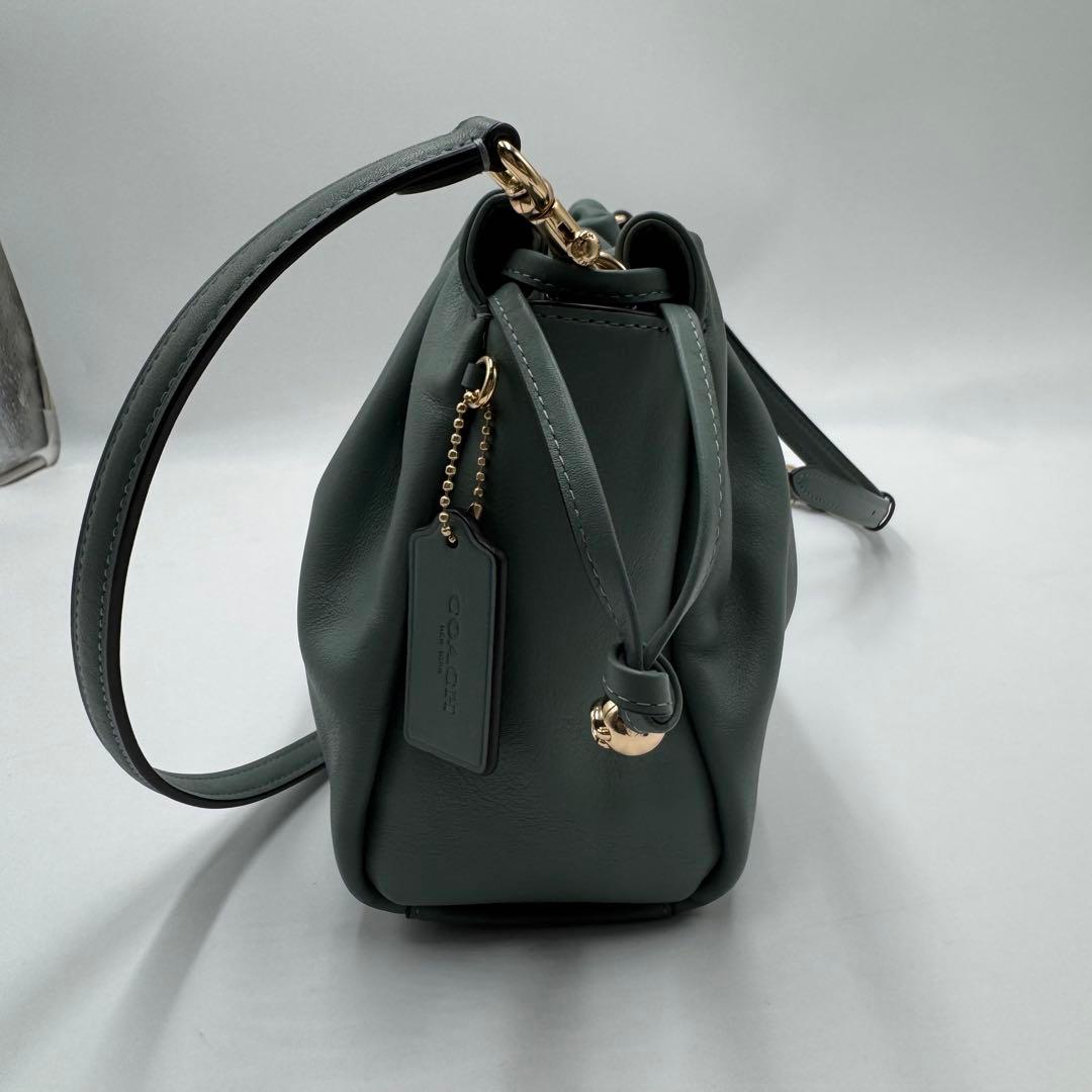 美品✨ コーチ フェイ ドローストリングバッグ レザー 巾着 ゴールド金具 水色