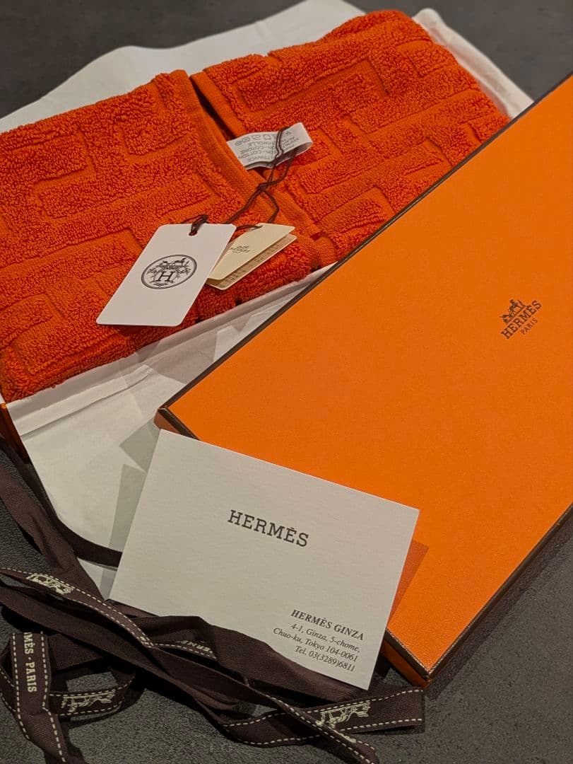 HERMES オレンジ フェイスタオル《ステアーズ》