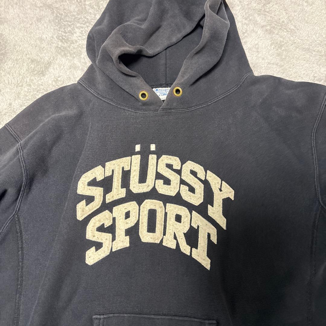 STÜSSY SPORT パーカー 黒 Championロゴ付き