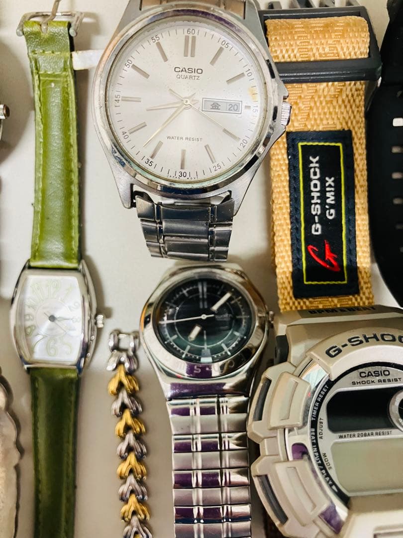 腕時計ジャンク34個 CASIO シチズンswatch 他