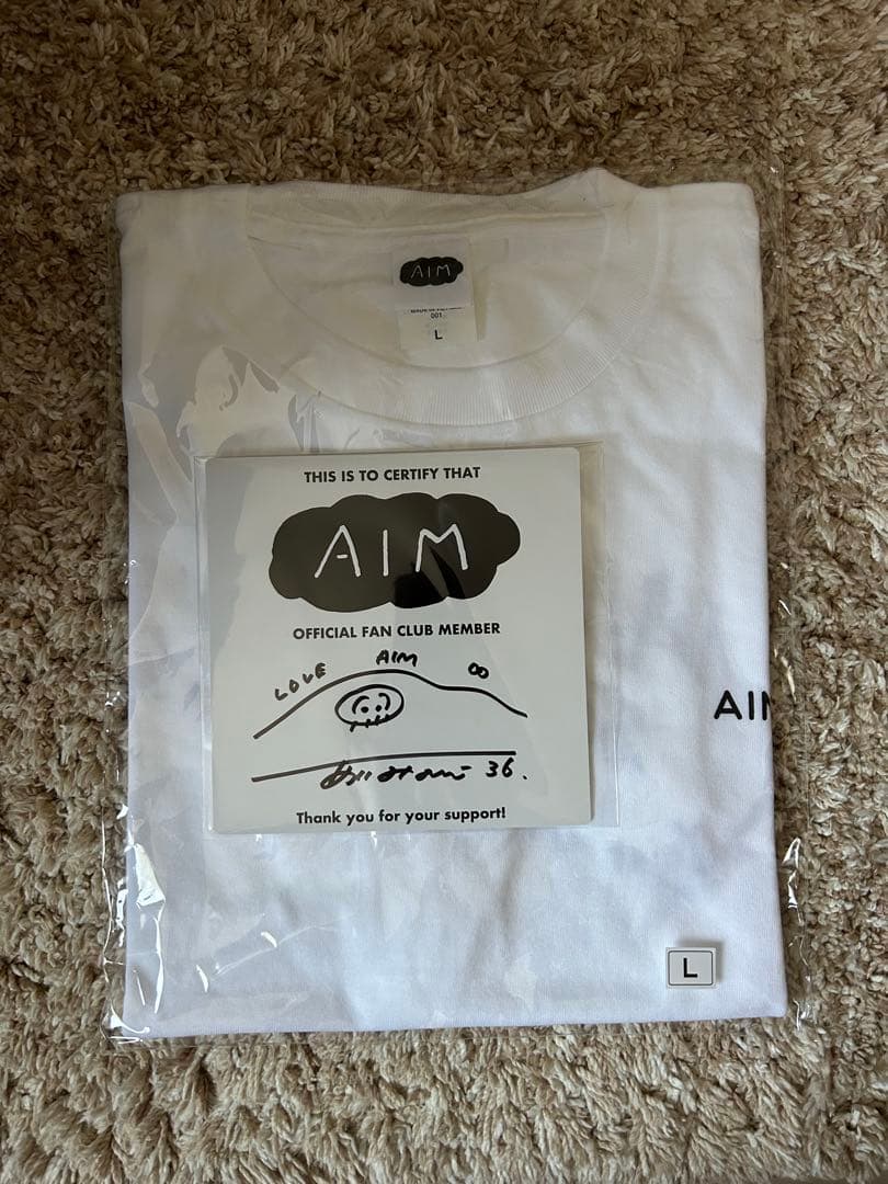 AIM限定デザインTシャツ＆直筆サイン入りミニ色紙セット