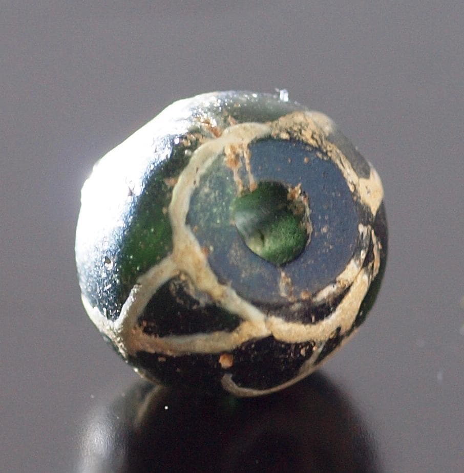 ジャワ発掘、珍しい横向き鳥マニック・ブルン　黒の胎に白で鳥・放射・Ｘ・環モチーフ