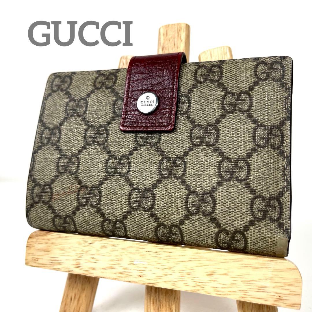グッチ　折り財布　GGスプリーム　ロゴ総柄　がま口　ミディアム　PVC レザー