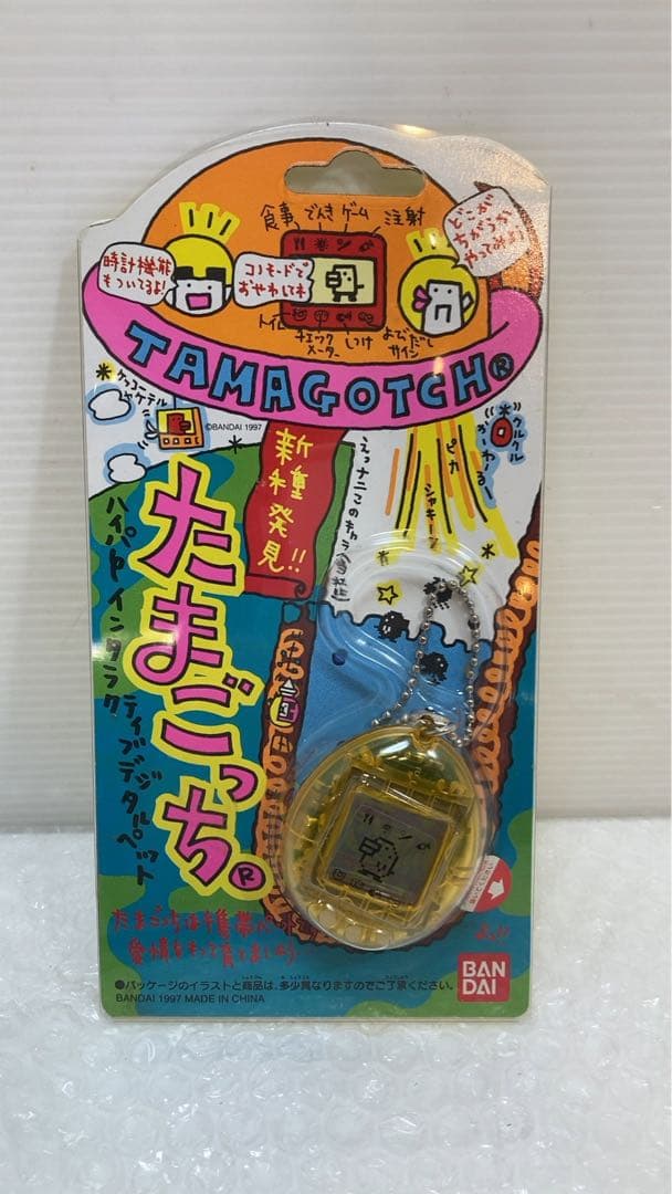 新種発見！！　たまごっち　BANDAI 1997 クリアオレンジ　①