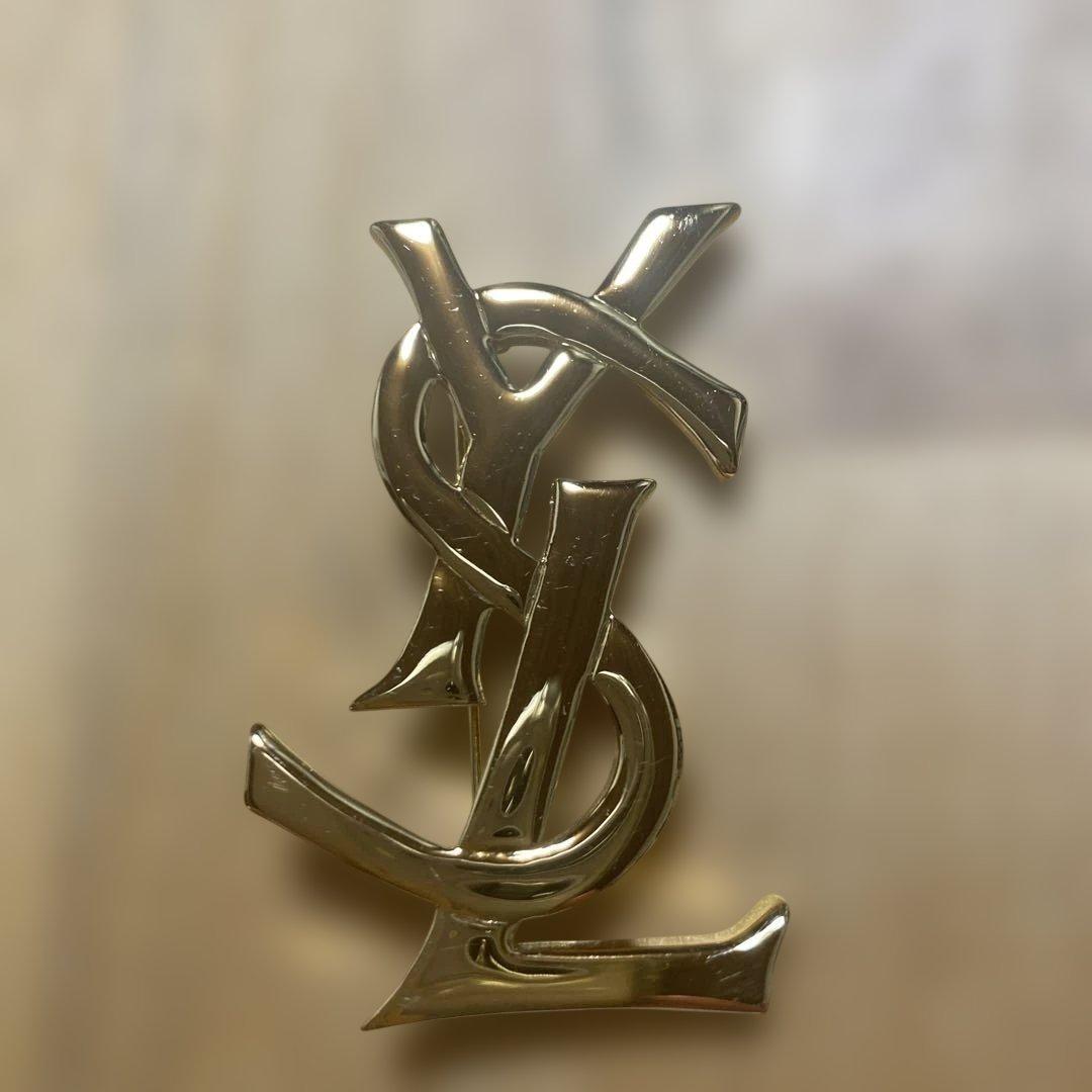 イヴ・サンローラン　 ロゴ　ブローチ　ゴールド