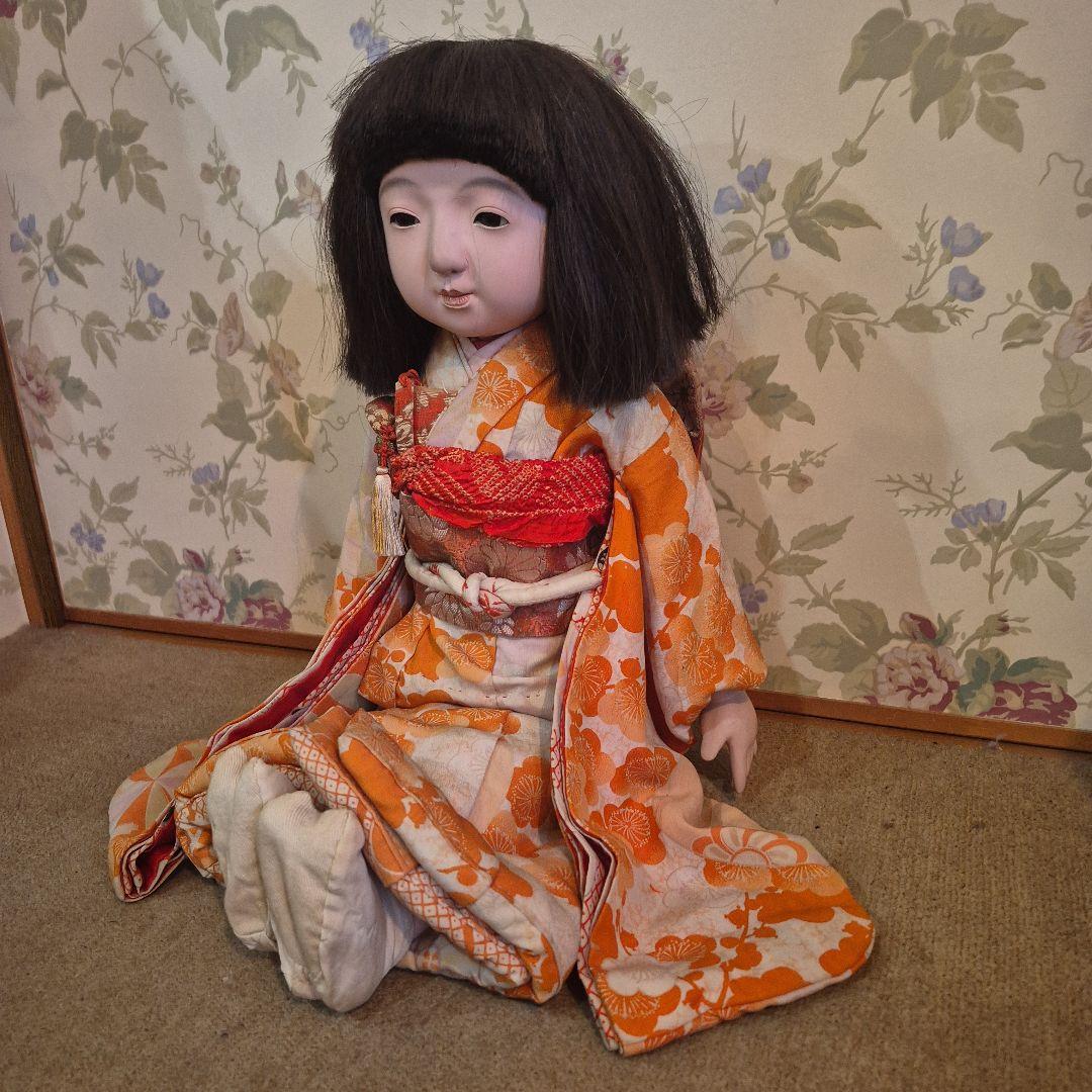 市松人形 オレンジの梅柄