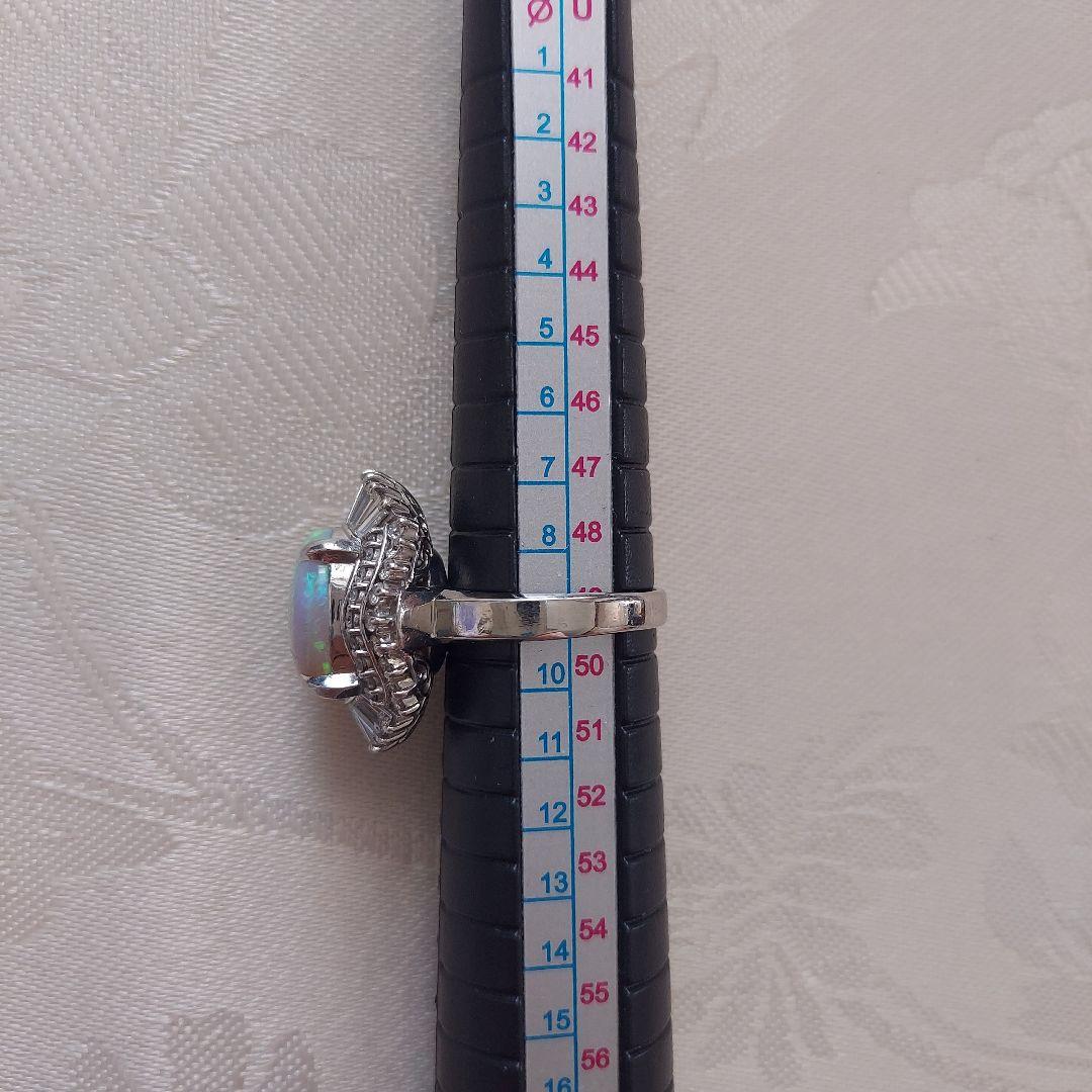 オパール3.25ct 重量12.5g ダイヤ取巻き大粒オパール指輪