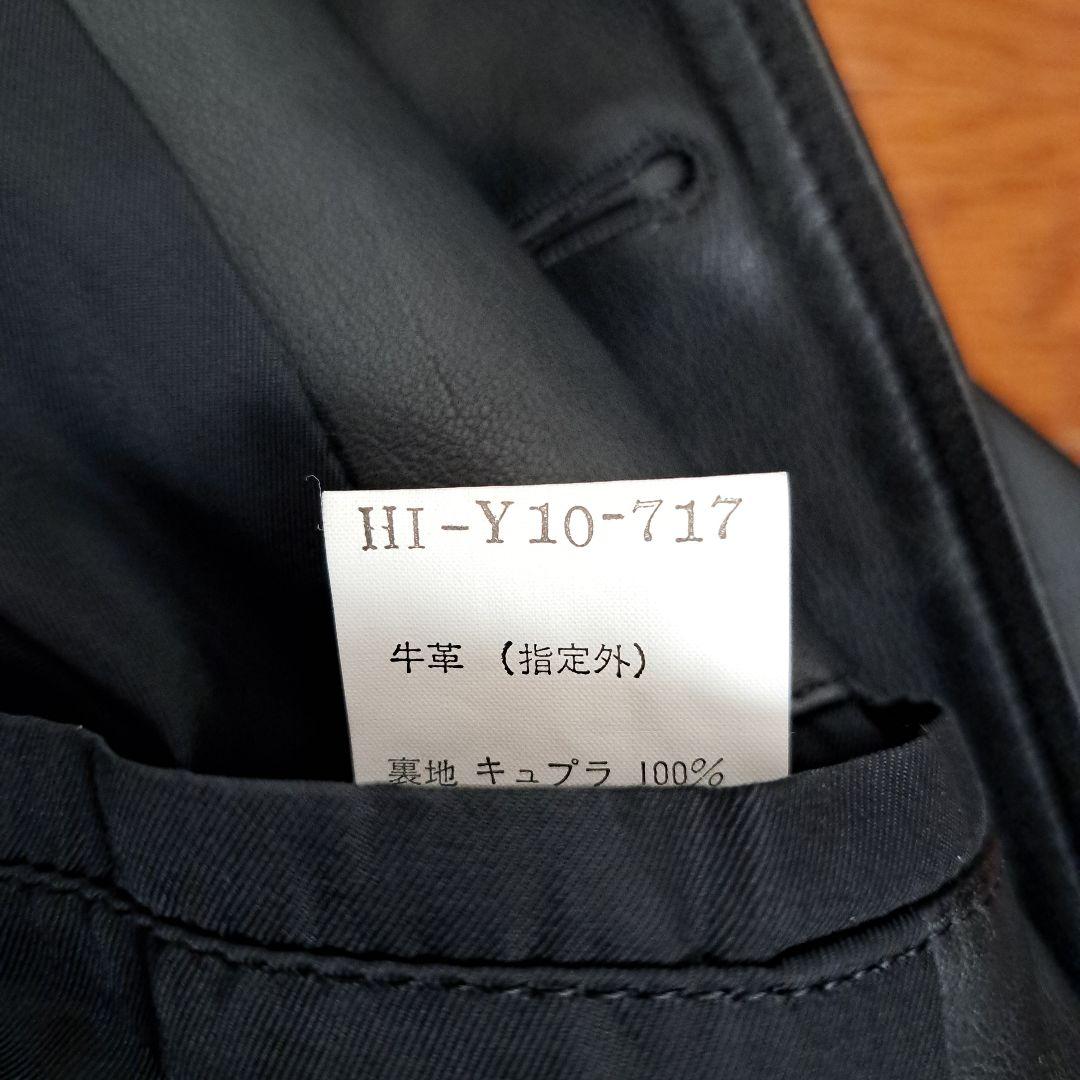 黒レザージャケット ボタン留め 襟付き