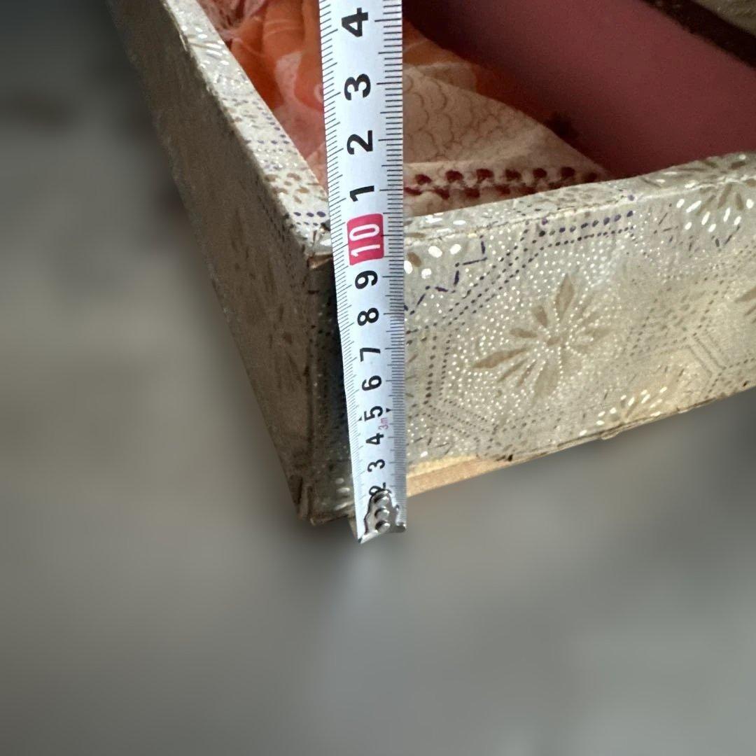 曰く付き…オレンジ色の和装ドレス日本人形