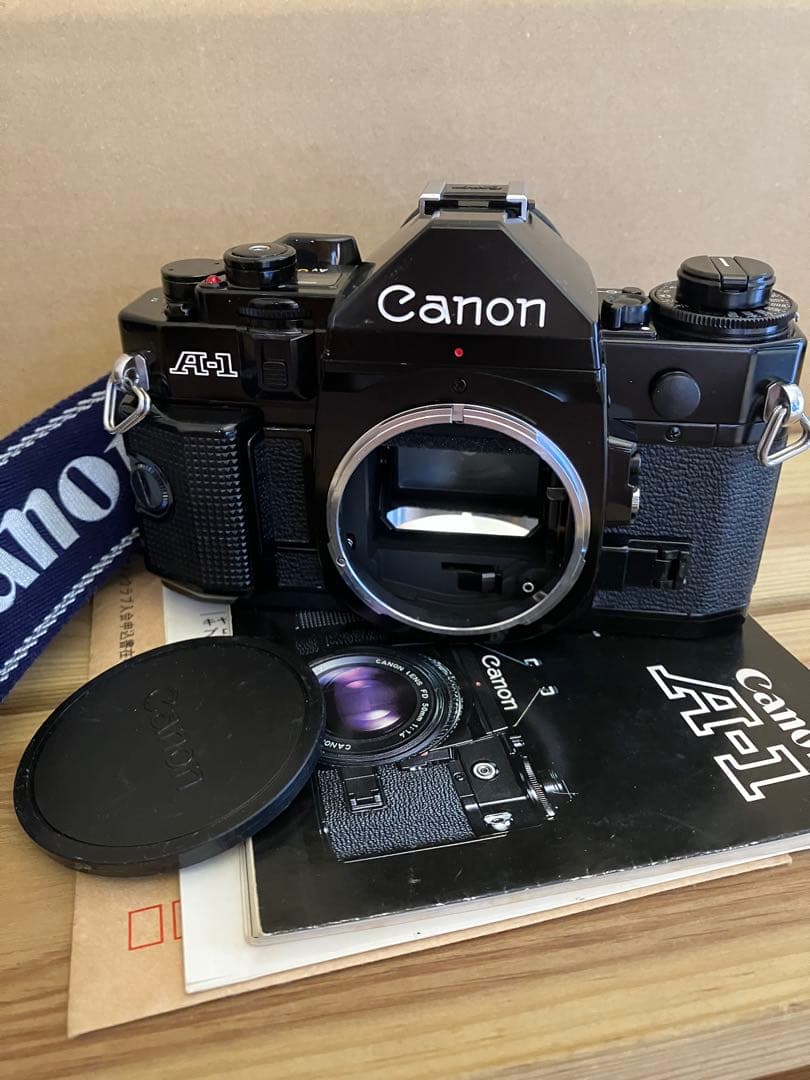 R*e様 Canon A-1 フィルム一眼レフカメラ 説明書、ストラップ付 極上