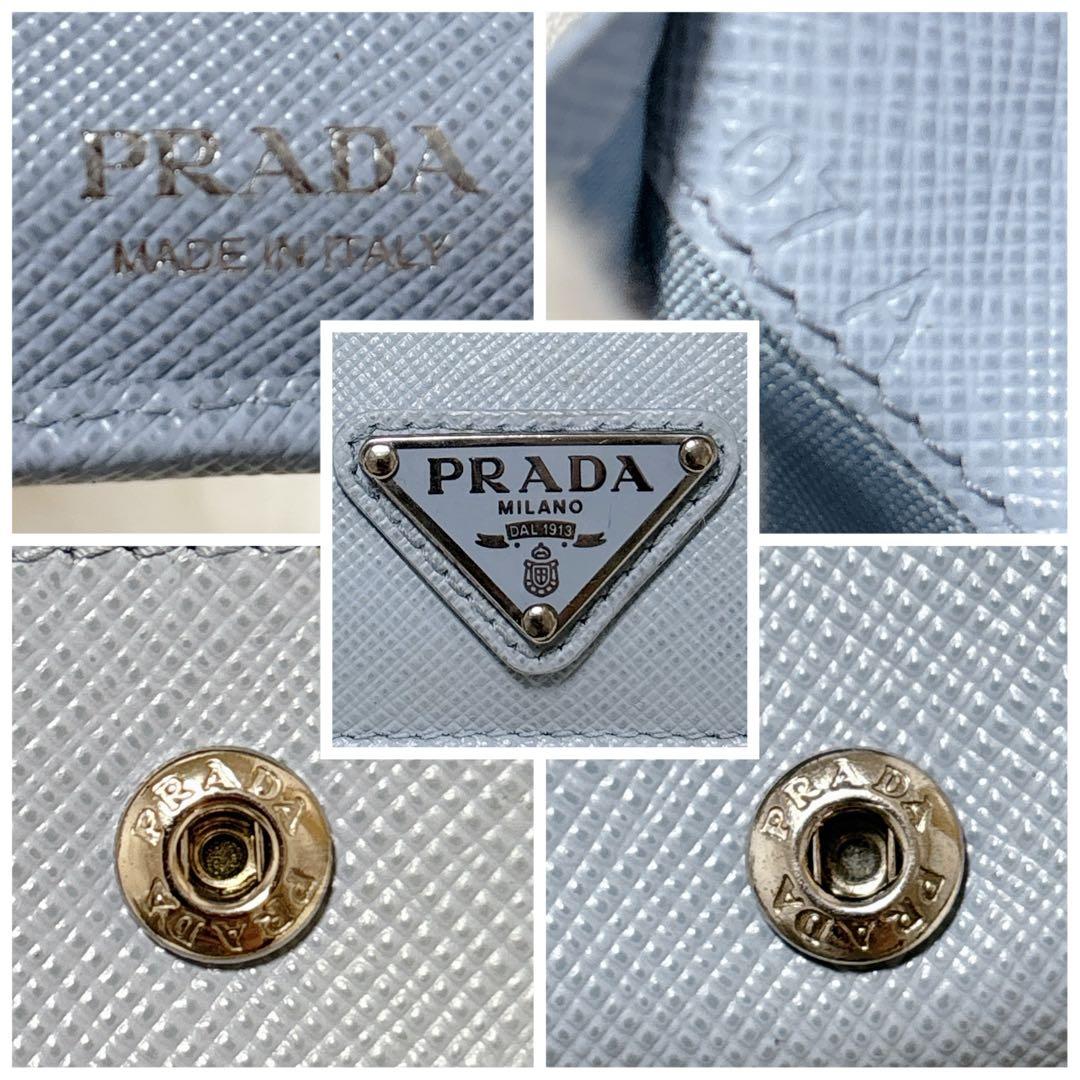 美品/現行✨プラダ 二つ折り財布 三角ロゴ レザー RFID ライトブルー 水色