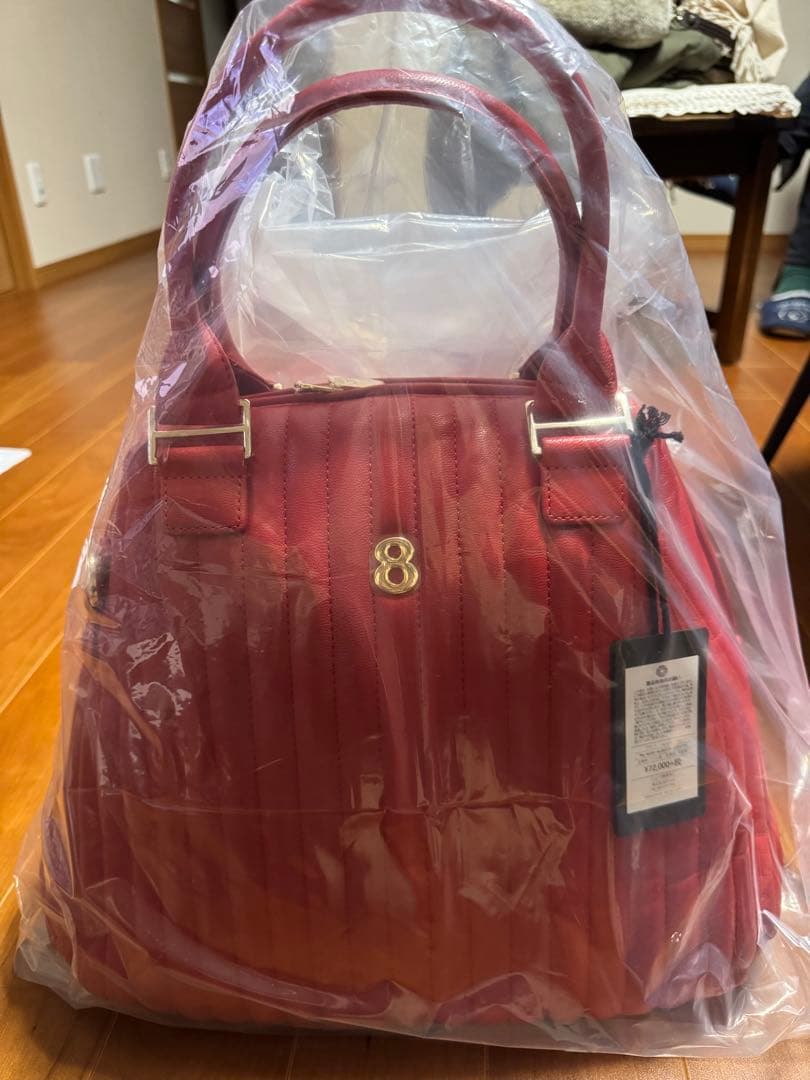 ムータ　赤 ショルダーバッグ