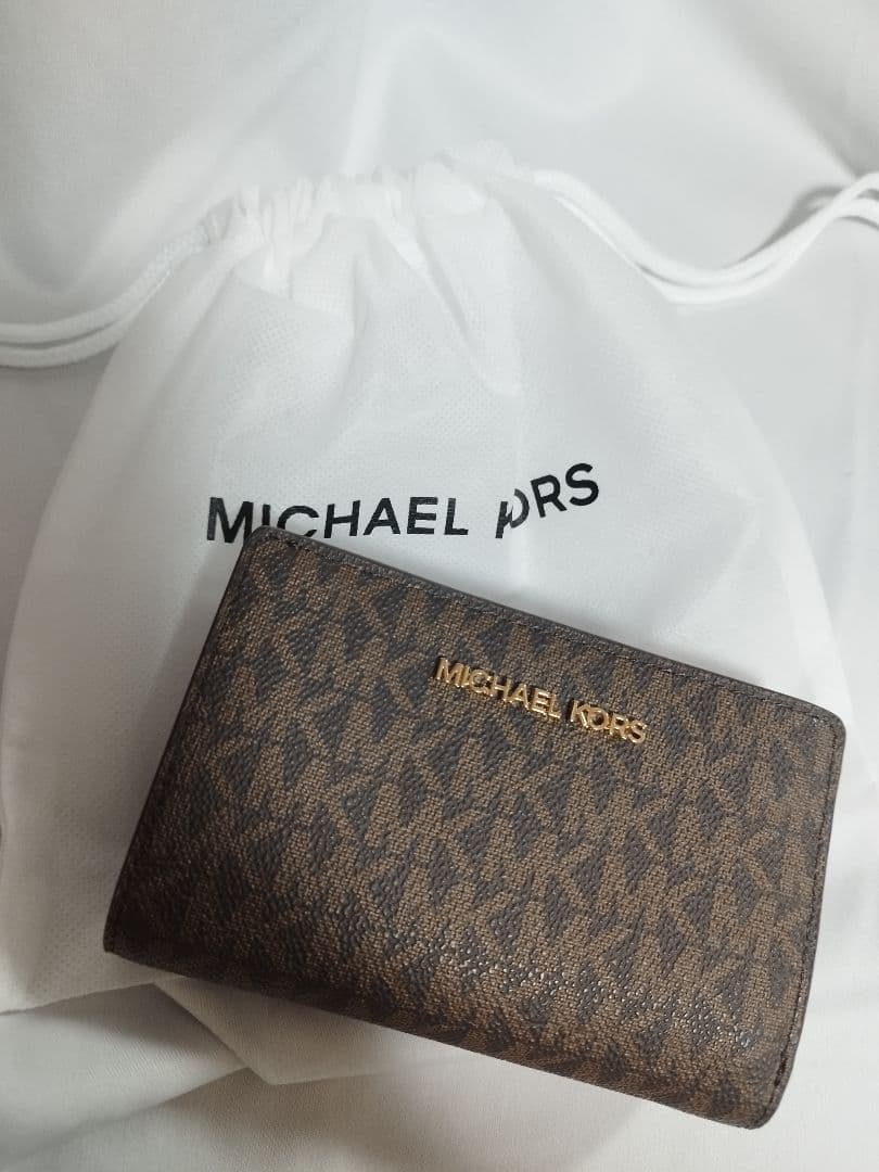【未使用】MICHAEL KORS マイケルコース 二つ折り財布 シグネチャー