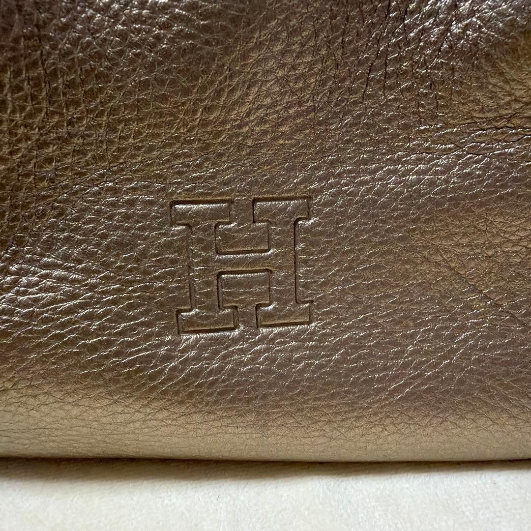 ヒロフ　メタリックゴールド レザー ハンドバッグ