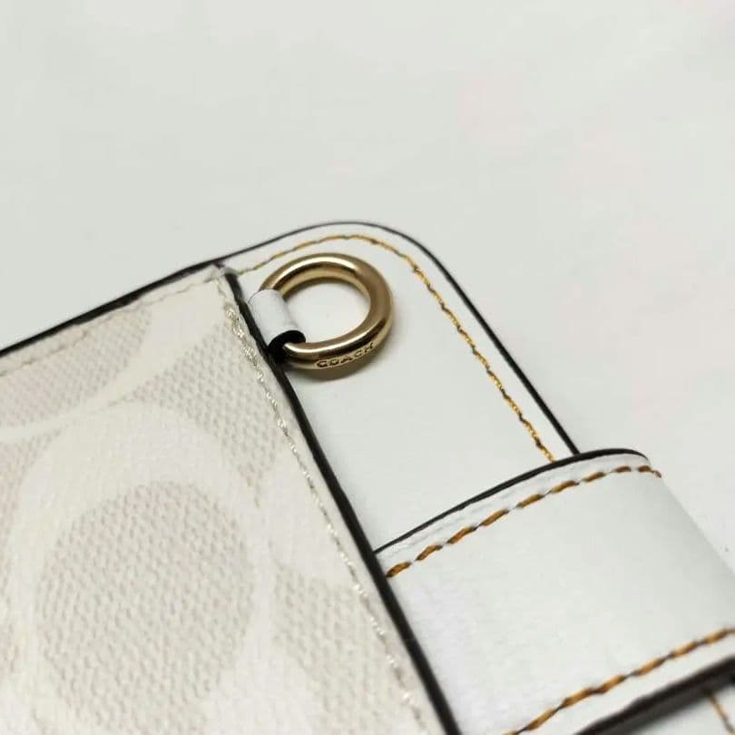 美品 COACH フォーンクロスボディ 蜂柄 スマホショルダー d27