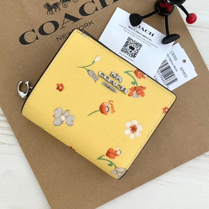★ COACH コーチ　折り財布　イエロー 二つ折り財布 花柄