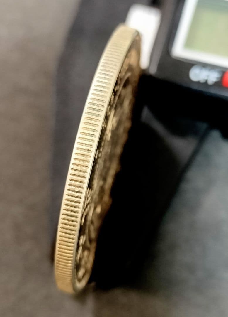 能*ー様 銀貨保証一円銀貨明治7年目方約27g銀含有率約90.6% 古銭1円銀貨