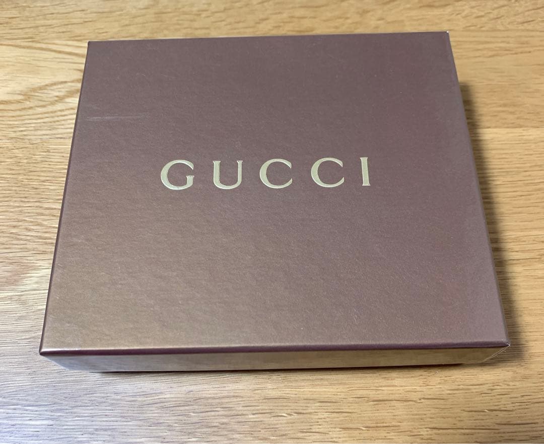 Gucci 財布　二つ折り　未使用　ホワイト　GGシマ