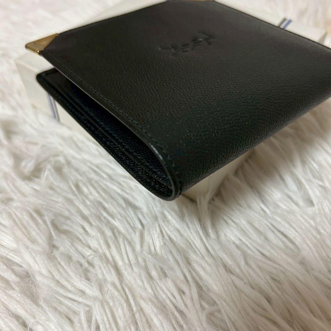 イヴサンローラン 二つ折り財布　ロゴ型押し ブラック