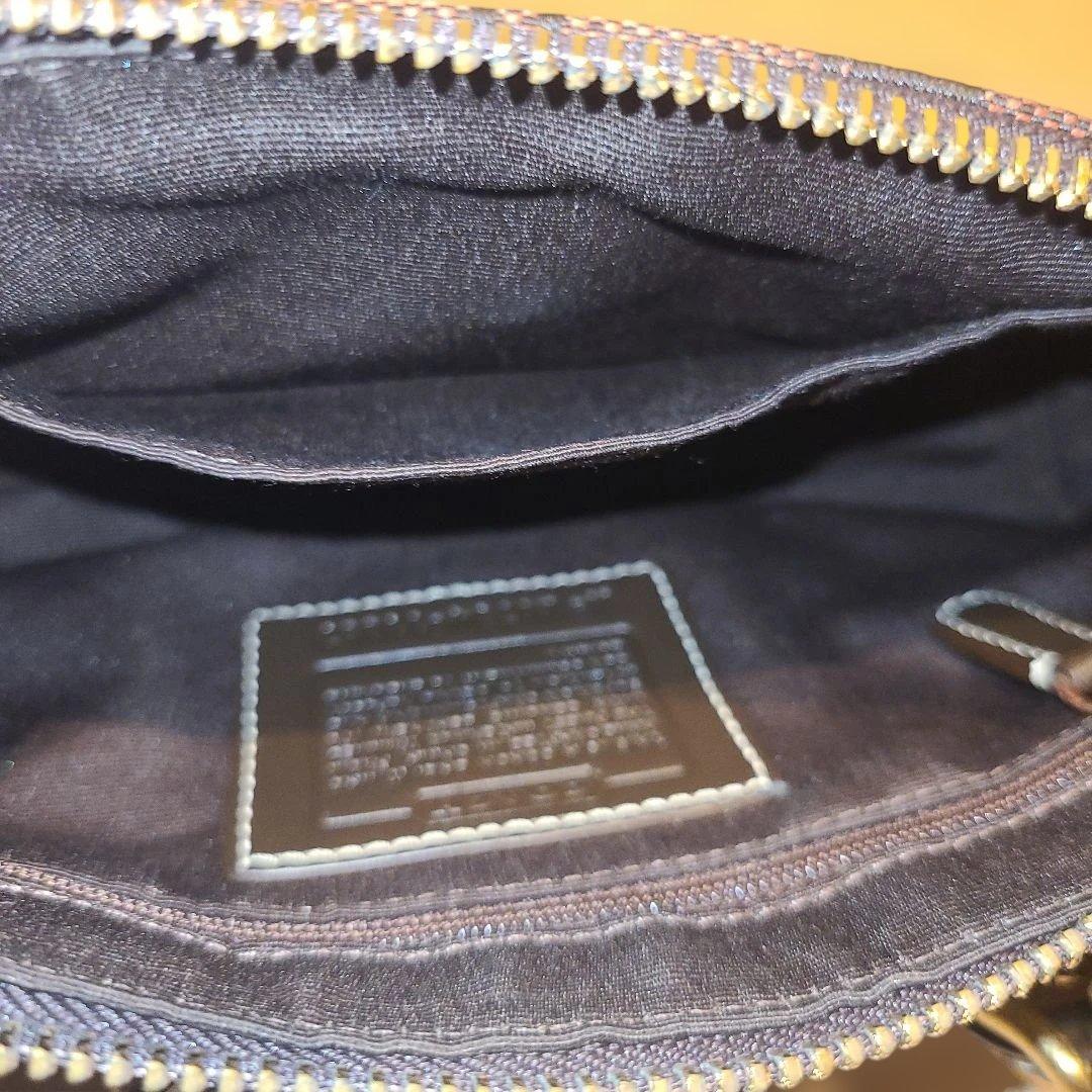 コーチ アクセサリーポーチ ワンショルダーバッグ シグネチャー ターンロック 茶