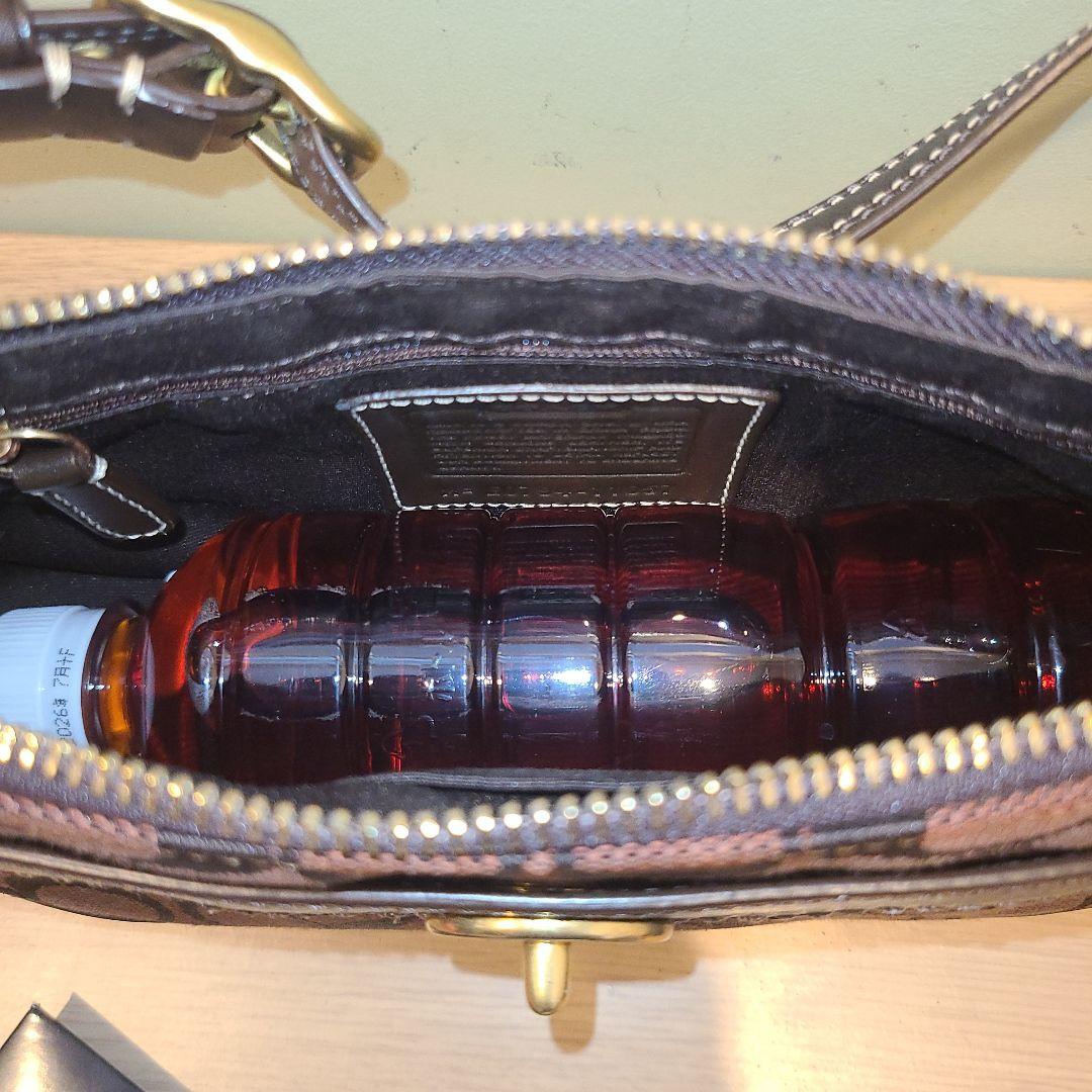 コーチ アクセサリーポーチ ワンショルダーバッグ シグネチャー ターンロック 茶