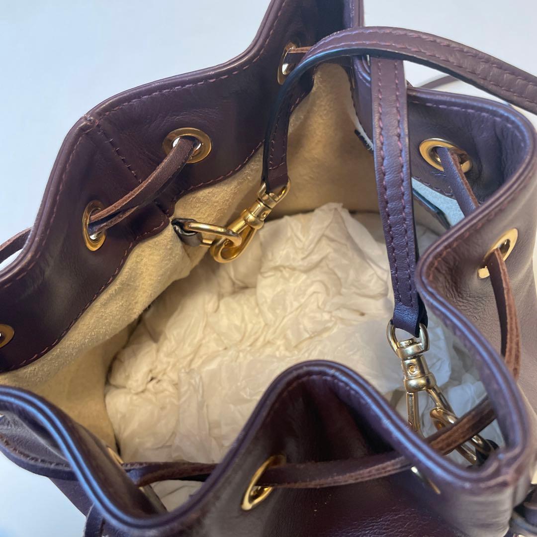 J&M DAVIDSON ブラウンフリンジバケットバッグ