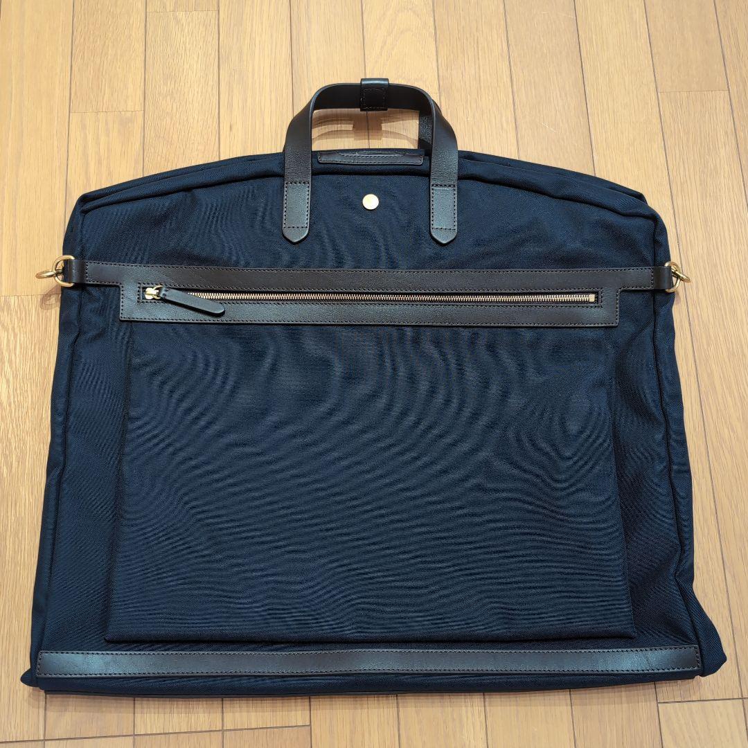 MISMO ミスモ ナイロンガーメントバッグ