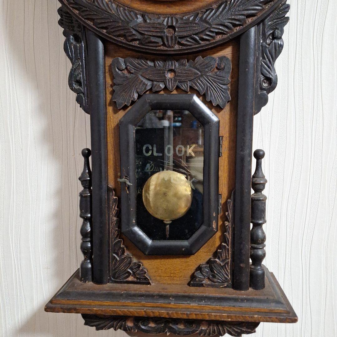 324 彫刻入り振り子掛時計　小型ひまわり柱時計