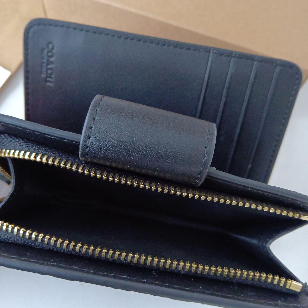 ✨️COACH ブラック シグネチャー✨️　二つ折り財布　保存袋＆お箱付き
