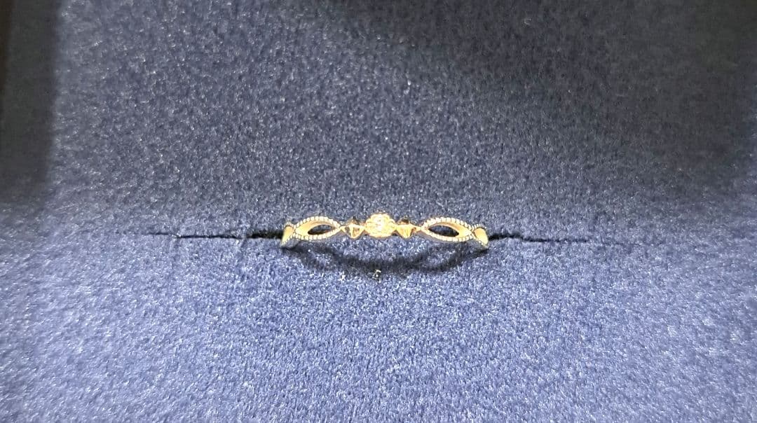 K10WG 5号 　ダイヤモンドリング　　透かし模様 ミル打ち