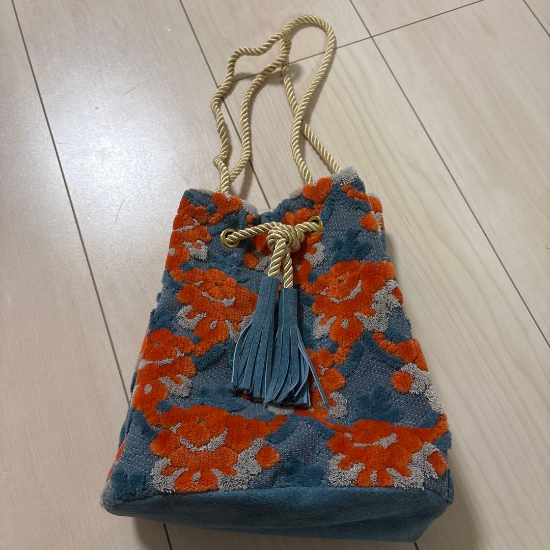 PUPU LAUKKU 金華山巾着　水色とオレンジのマグノリア　花柄巾着バック