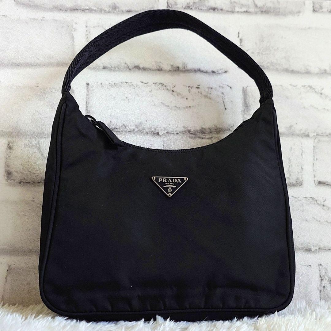 プラダ アクセサリーポーチ ミニハンドバッグ 三角ロゴ ブラック レディース
