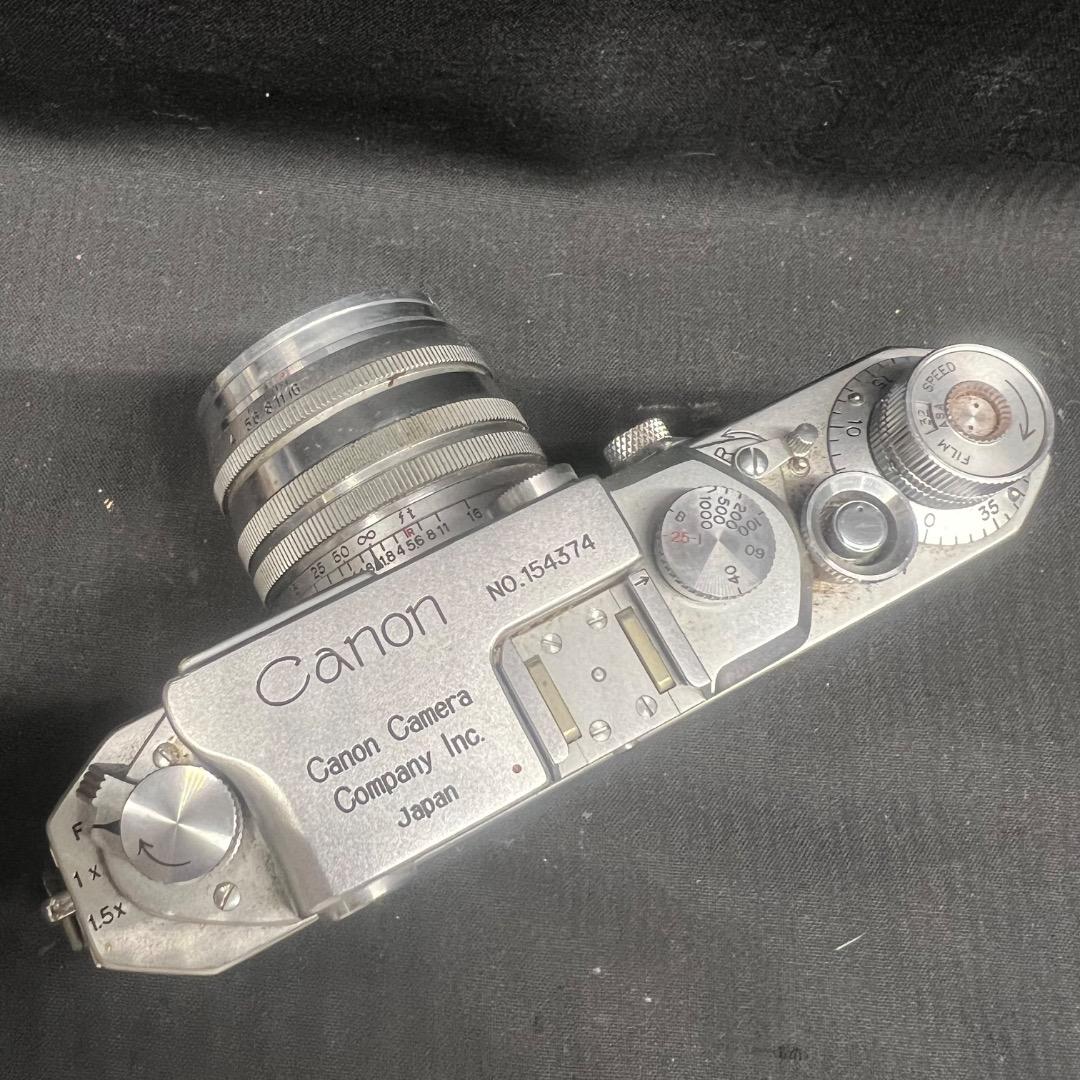 〇Nb右1058 キャノン フィルムカメラ No.154374 レザーケース付