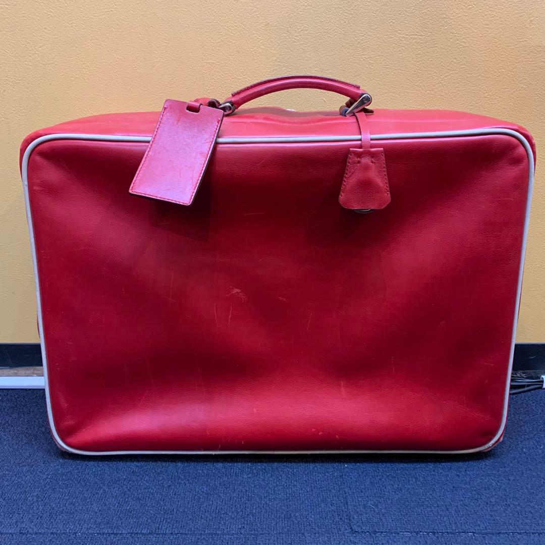 プラダ　PRADA トラベルバッグ　旅行用　スーツケース　赤　レッド　プレート