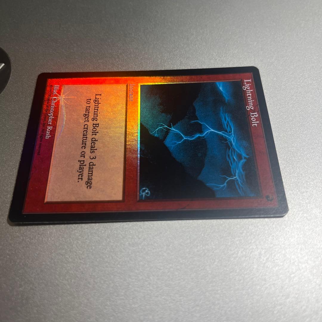 ③ MTG foil 《稲妻/Lightning Bolt》(ジャッジ褒賞)旧枠