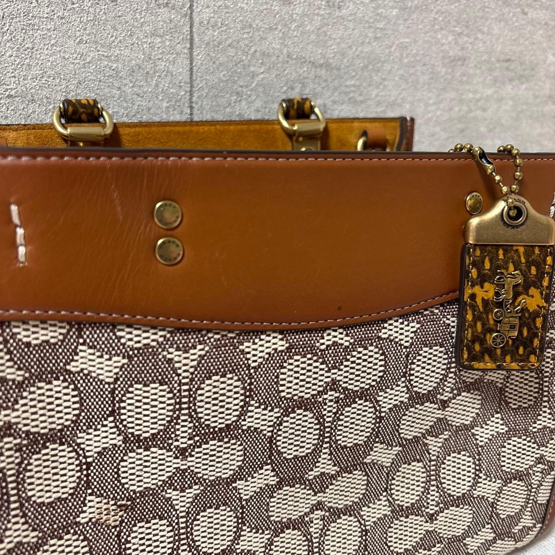 【お値下げ中】COACHローグ25 シグネチャーテキスタイル ハンドバッグ
