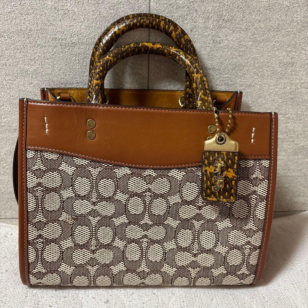 【お値下げ中】COACHローグ25 シグネチャーテキスタイル ハンドバッグ