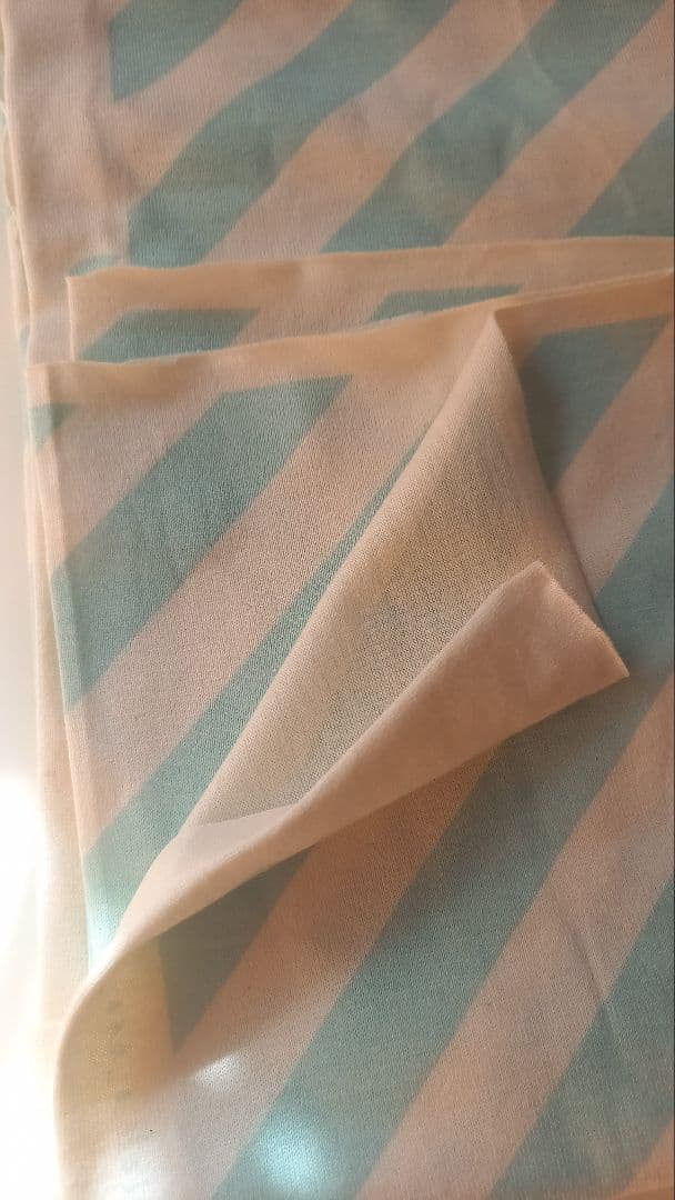 斜めストライプの服