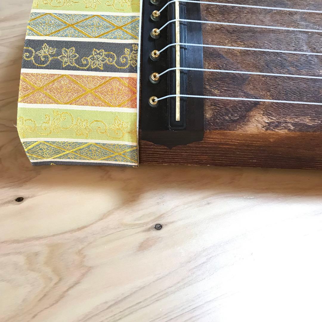 お琴　13弦　くり甲　綾杉彫　玉縁